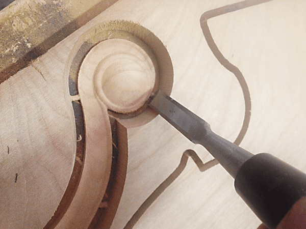 A sharp chisel makes quick work of removing tabs cleanly.